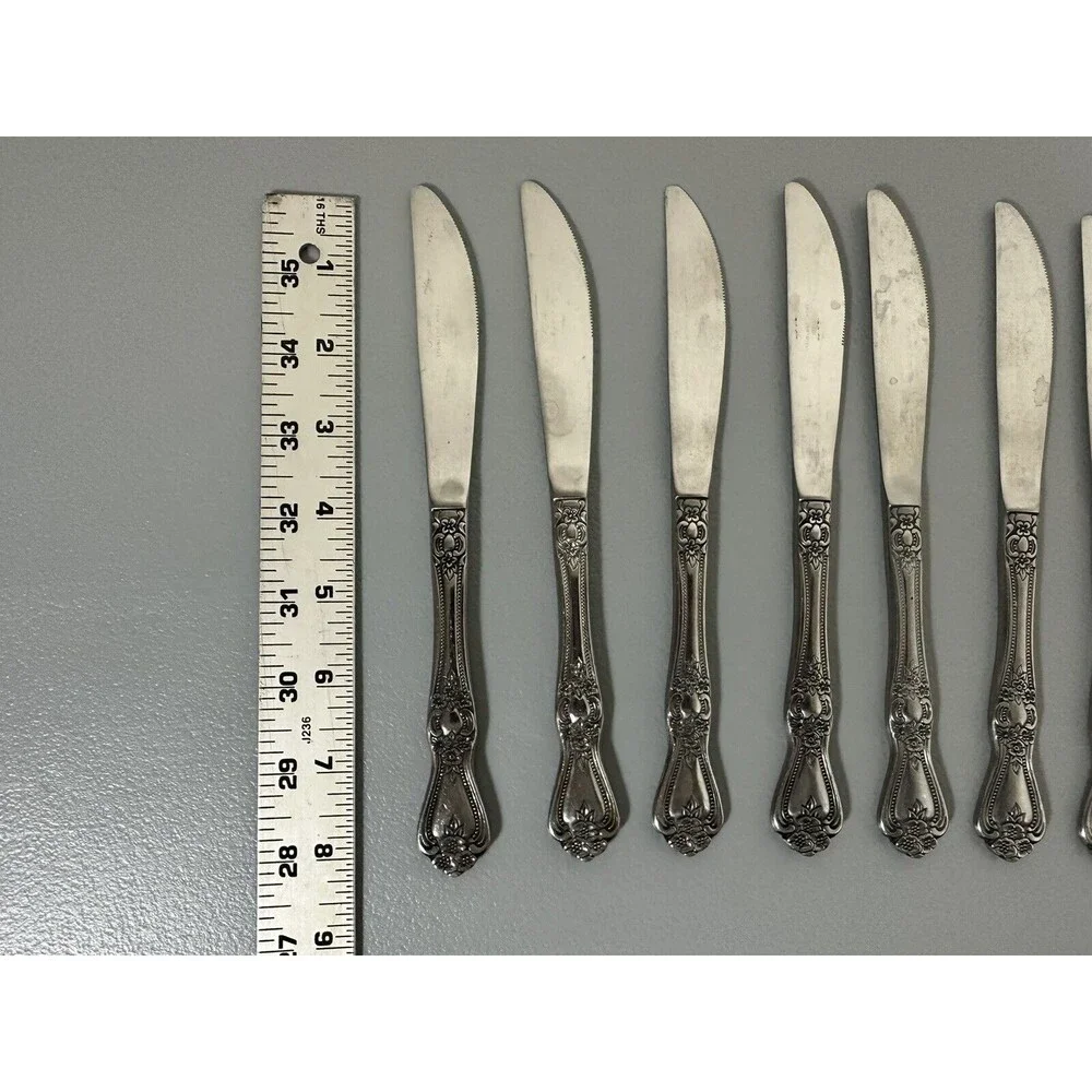 Rogers Co. stainless flatware Rose Set Of 8 dinner knives 8 1/2